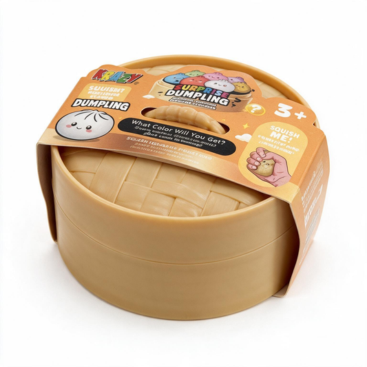 A plastic toy dumpling-shaped container in a tan color, wrapped in a cardboard sleeve with cartoon graphics and text including 'Dumpling' and 'Squish Me!'.