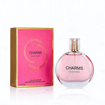 Charms Eau de Parfum 100ml bottle next to its pink and gold packaging box, displayed on a clean white background with a subtle reflection.