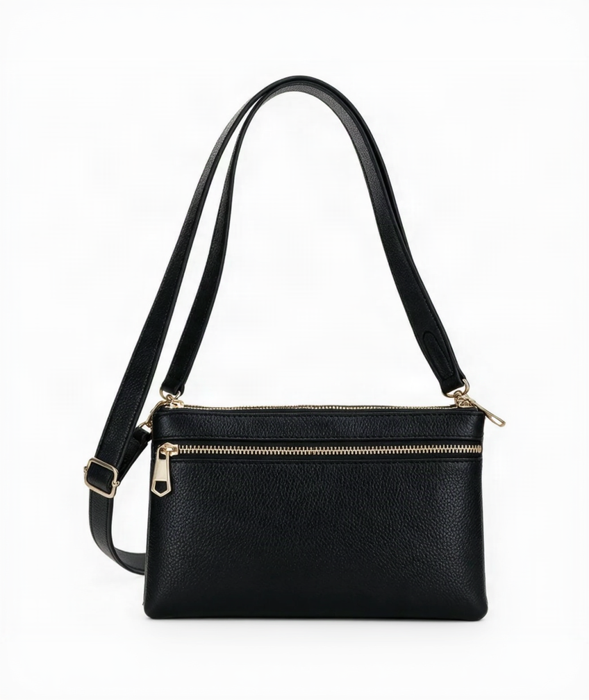 A black pebbled leather crossbody handbag with a single shoulder strap and gold-tone hardware, shown against a plain white background.
