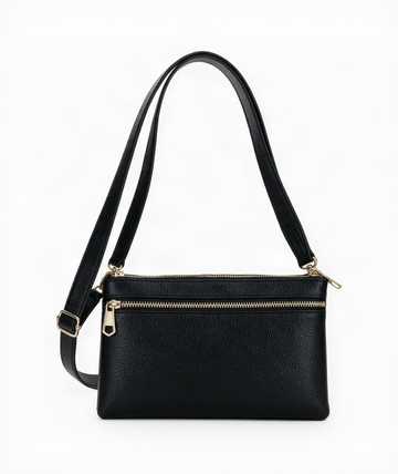 A black pebbled leather crossbody handbag with a single shoulder strap and gold-tone hardware, shown against a plain white background.