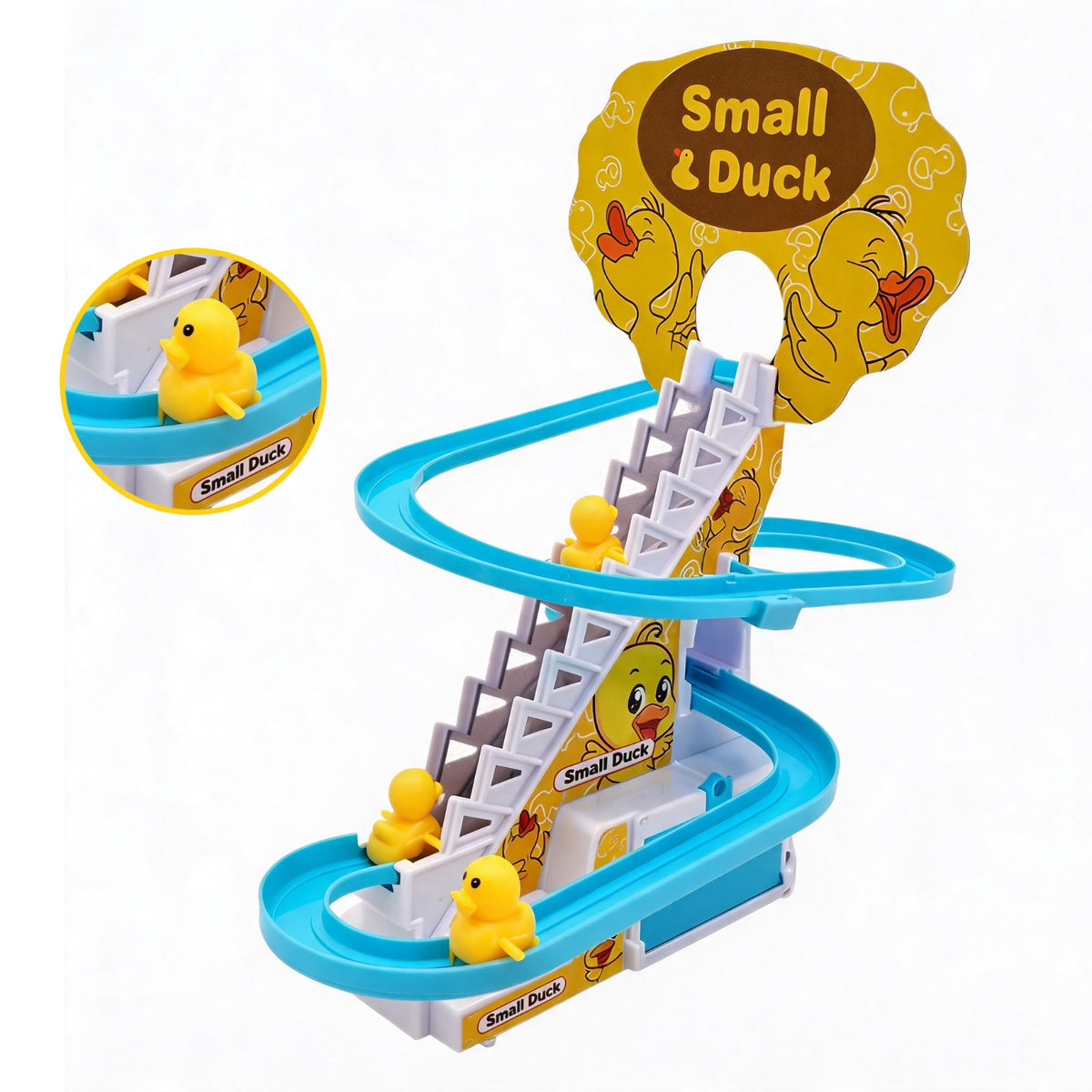 A children's toy race track set labeled 'Small & Duck' with bright blue curved tracks, white stair-like barriers, small yellow duck figures, and a large yellow duck-head sign. A circular inset shows a close-up of a duck on a blue section.