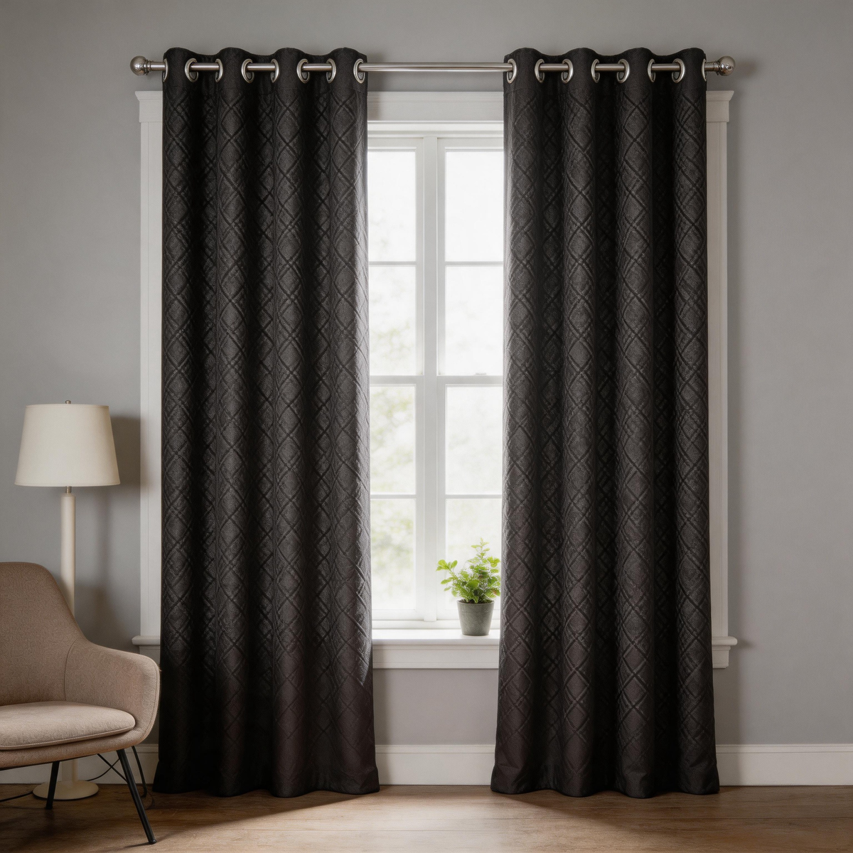 A pair of dark brown grommet curtains with a subtle diamond pattern, hanging on a silver rod over a window in a modern living room setting.