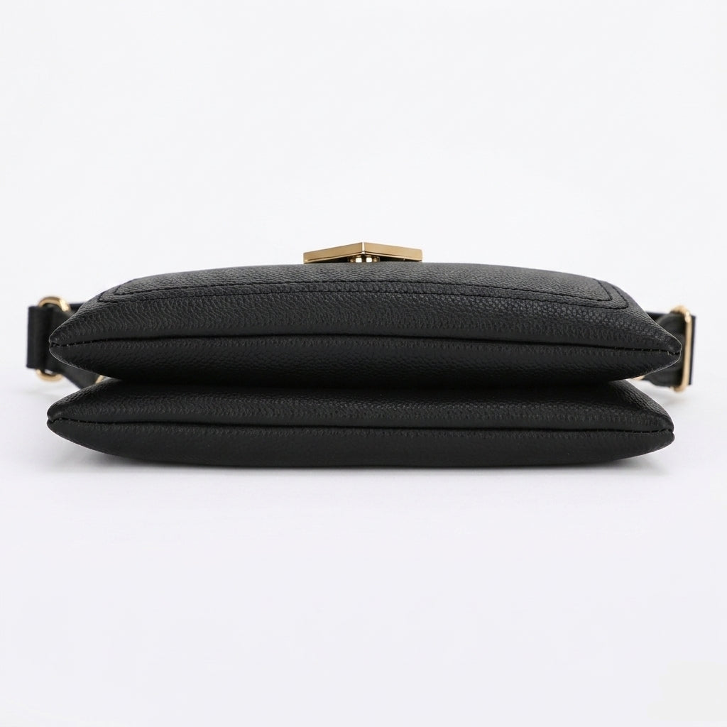 A black textured leather crossbody bag with a gold-tone clasp and strap hardware, shown from the back on a white background.