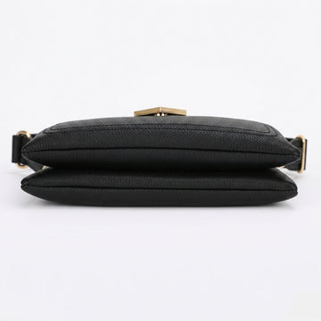 A black textured leather crossbody bag with a gold-tone clasp and strap hardware, shown from the back on a white background.