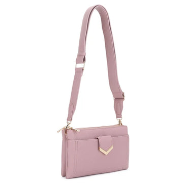 A dusty pink leather crossbody bag with a matching adjustable shoulder strap, gold-tone hardware, and a small chevron detail on the front flap, shown against a plain white background.