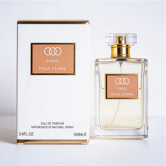Paris Eau de Parfum 100 ml bottle with its white and gold packaging box featuring a metallic emblem, displayed against a white background.